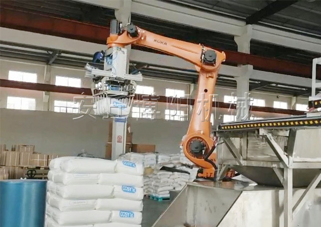 全自動拆包機使用案例  片堿全自動拆包機器人優(yōu)勢